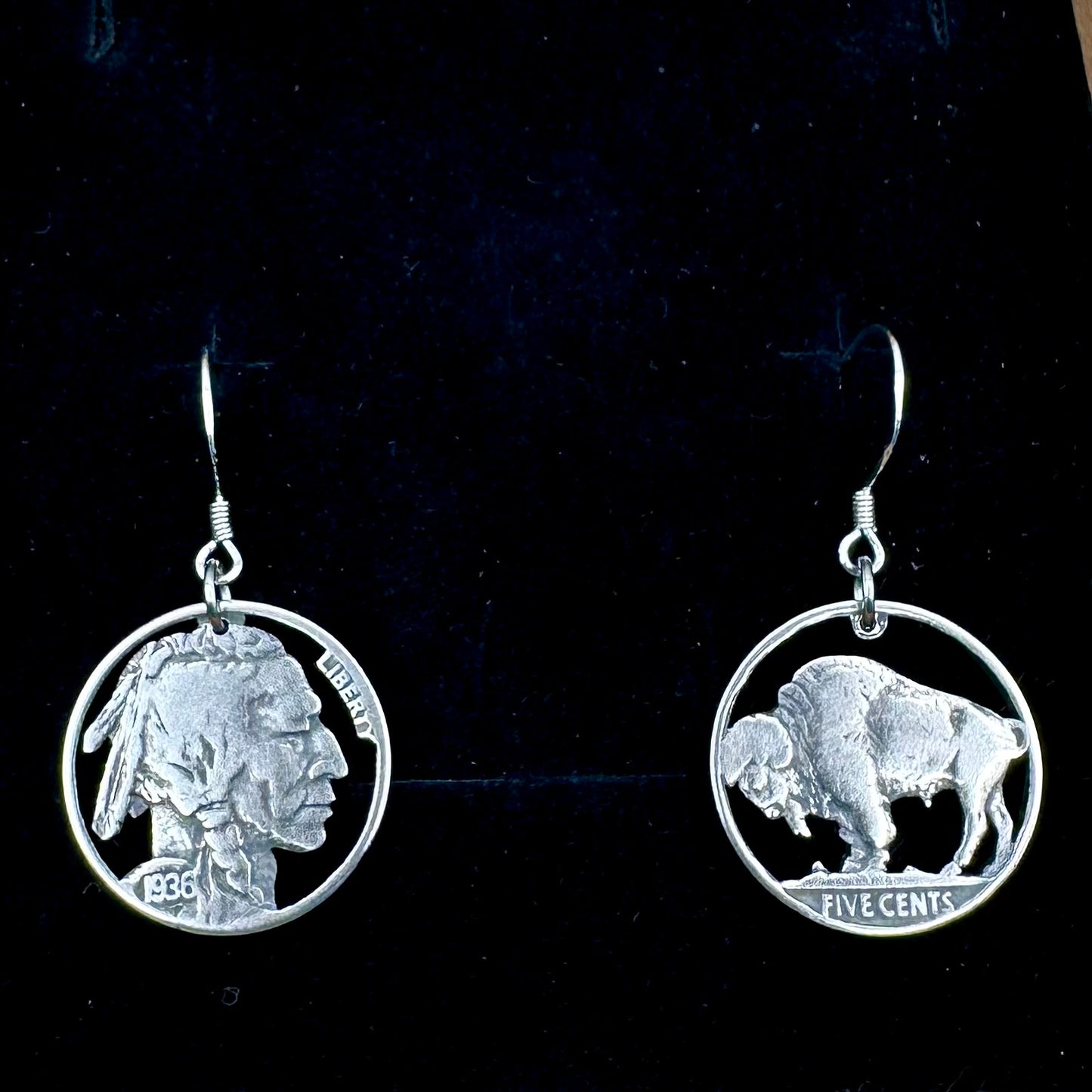 U.S. Buffalo Nickel Hand Cut Coin Earrings (combo) with sterling silver earring hooks on a black velvet background. - Mountainstruck Coin Jewelry
