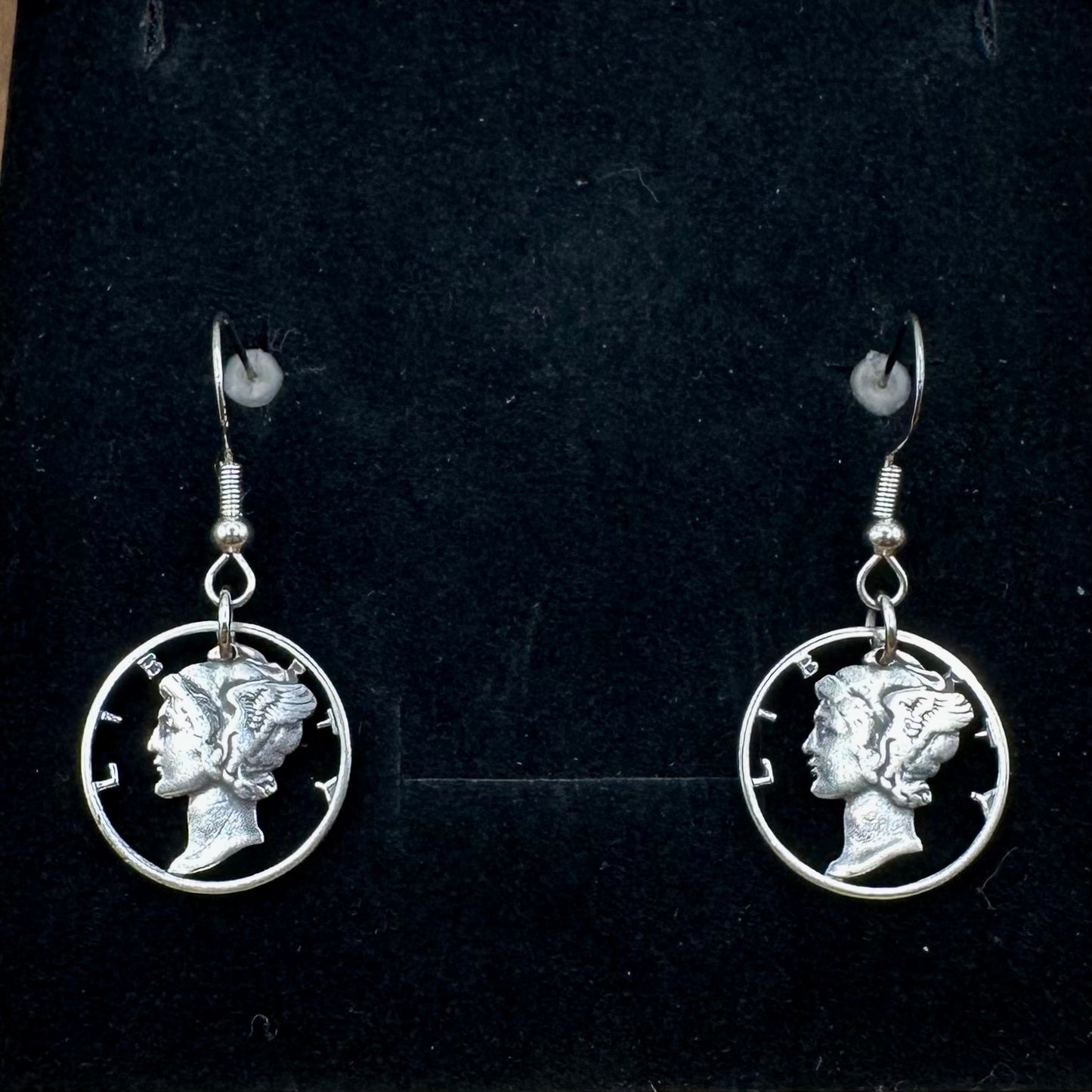 U.S. Mercury Dime Hand Cut Silver Coin Earrings on a black velvet background. - Mountainstruck Coin Jewelry