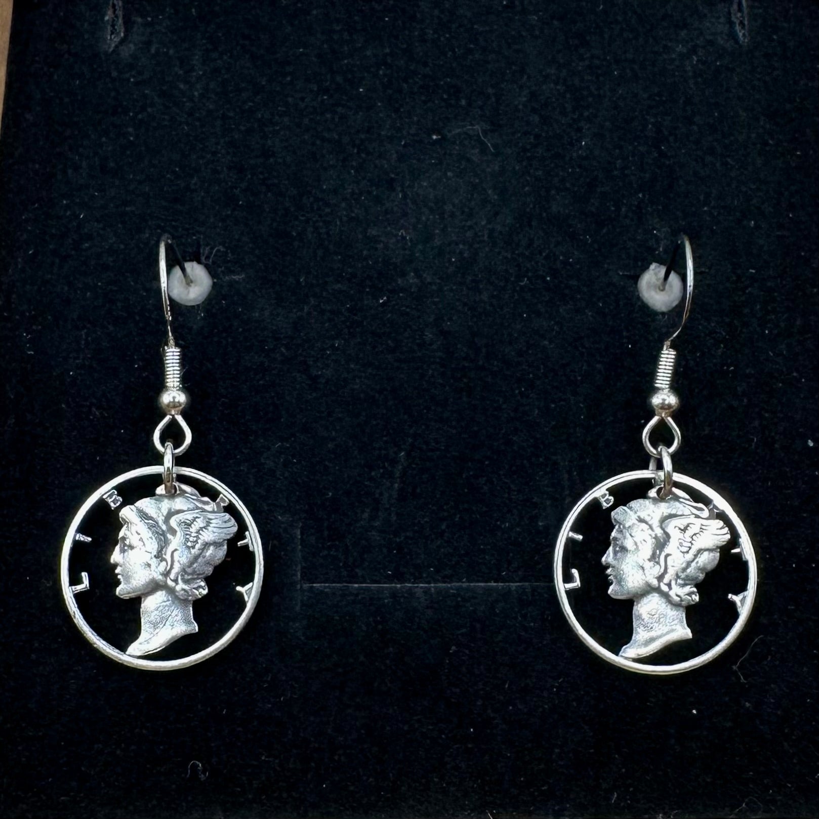 U.S. Mercury Dime Hand Cut Silver Coin Earrings on a black velvet background. - Mountainstruck Coin Jewelry