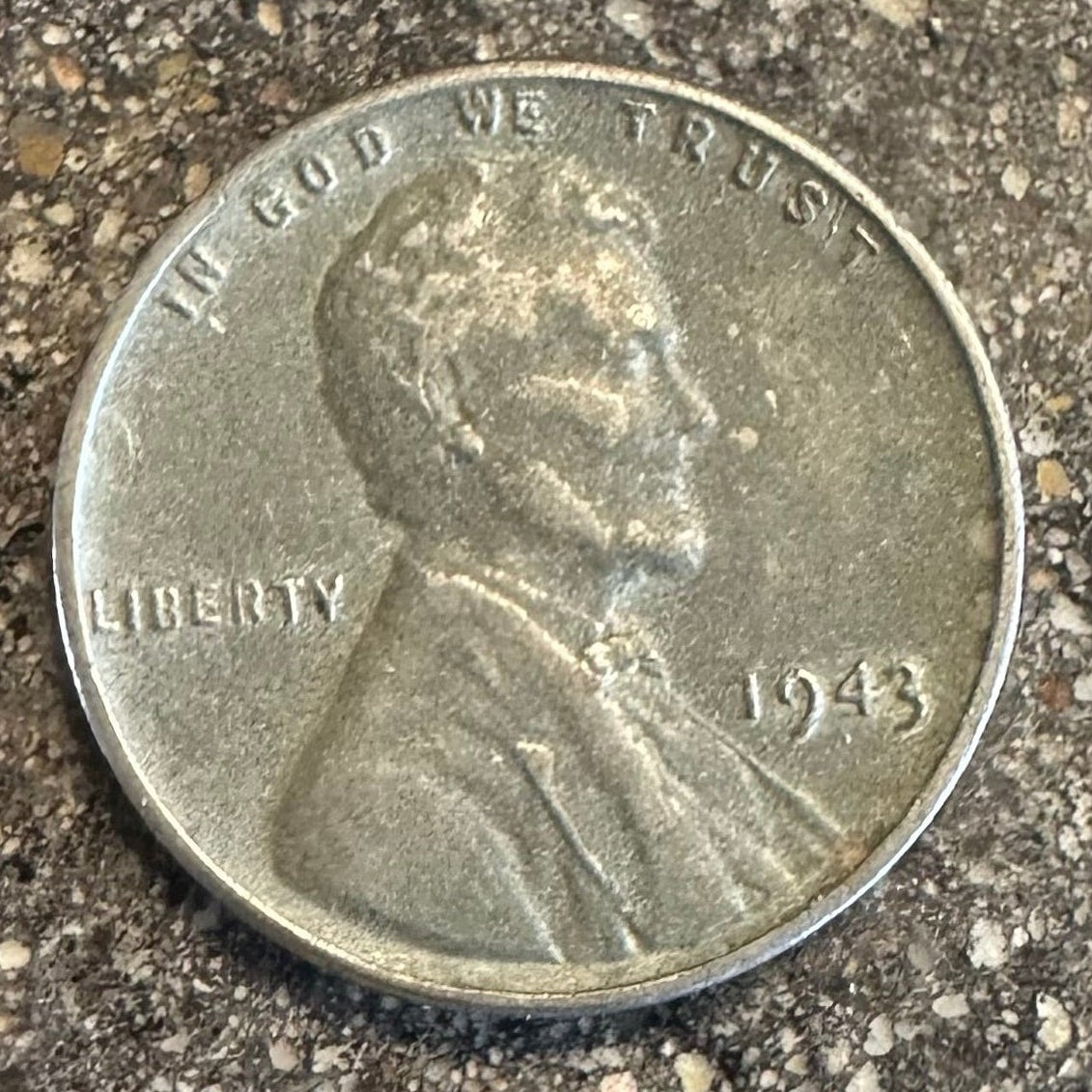 U.S. Steel Wheat Penny coin front on a concrete background. 
- Mountainstruck Coin Jewelry