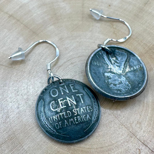 U.S. Steel Wheat Penny Domed Coin Earrings back on a light wood round. - Mountainstruck Coin Jewelry