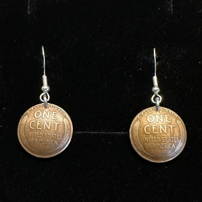 U.S. Wheat Penny Domed Coin Earrings in a brown kraft box on a black velvet background. - Mountainstruck Coin Jewelry