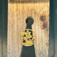 22k Solid Gold UK Gold Sovereign hand cut coin necklace on a wood background. - Mountainstruck Coin Jewelry