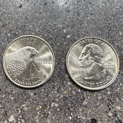 U.S. Idaho State Quarter on a concrete background. Back side of coin on the left of the image and front side of the coin on the right side.  - Mountainstruck Coin Jewelry