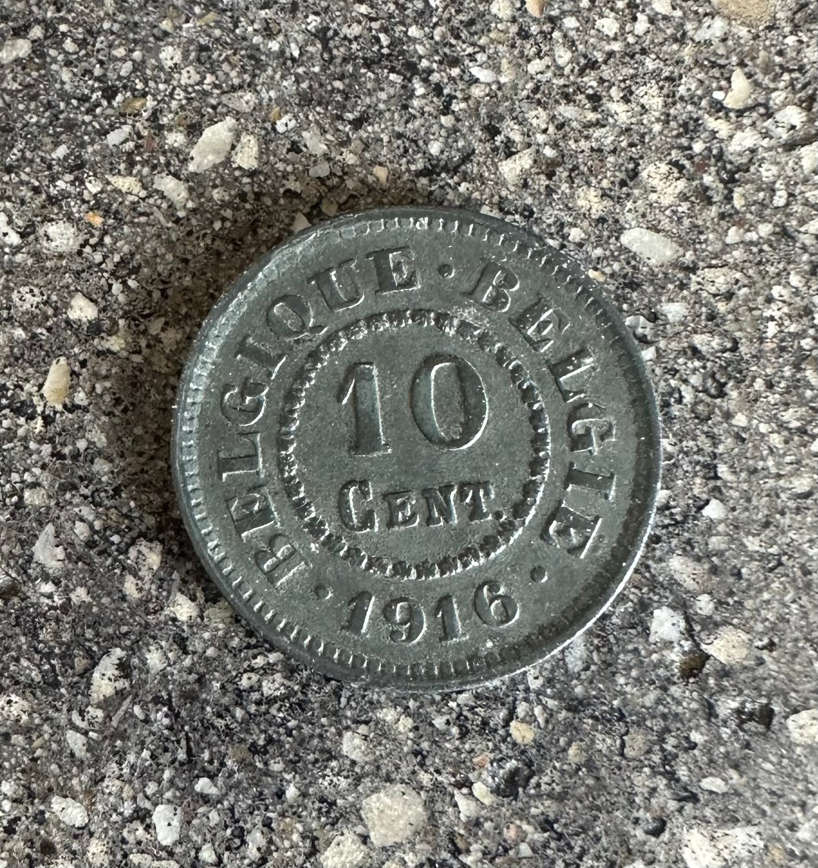 Belgium 10 Cents Lion back of coin on a concrete background - Mountainstruck Coin Jewelry