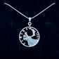 Caribou Canada Silver 25 Cent Hand Cut Coin Necklace on a black velvet  background. - Mountainstruck Coin Jewelry