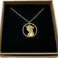 Cleopatra Egypt 50 Qirsh/Piastres Hand Cut Coin Necklace in a brown kraft box on a black velvet background. - Mountainstruck Coin Jewelry