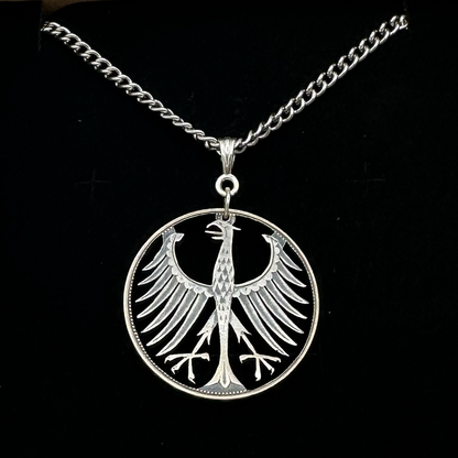Germany Silver Eagle 5 Mark Hand Cut Coin Necklace on black velvet background. - Mountainstruck Coin Jewelry