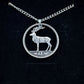 Irish Red Deer Hand Cut Coin Necklace on a black velvet background. - Mountainstruck Coin Jewelry