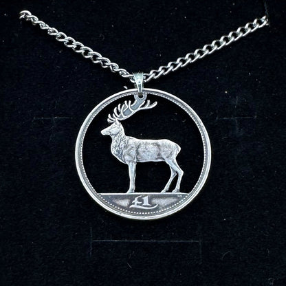 Irish Red Deer Hand Cut Coin Necklace on a black velvet background. - Mountainstruck Coin Jewelry