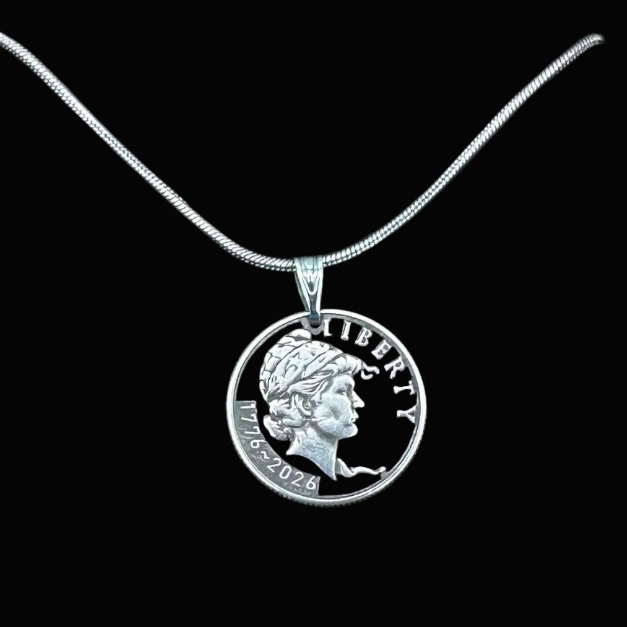 U.S. 2026 "Lady Liberty" Dime Hand Cut Coin Necklace on a black background. - Mountainstruck Coin Jewelry