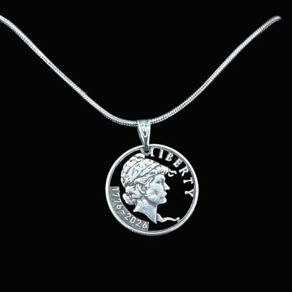 U.S. 2026 "Lady Liberty" Dime Hand Cut Coin Necklace on a black background. - Mountainstruck Coin Jewelry