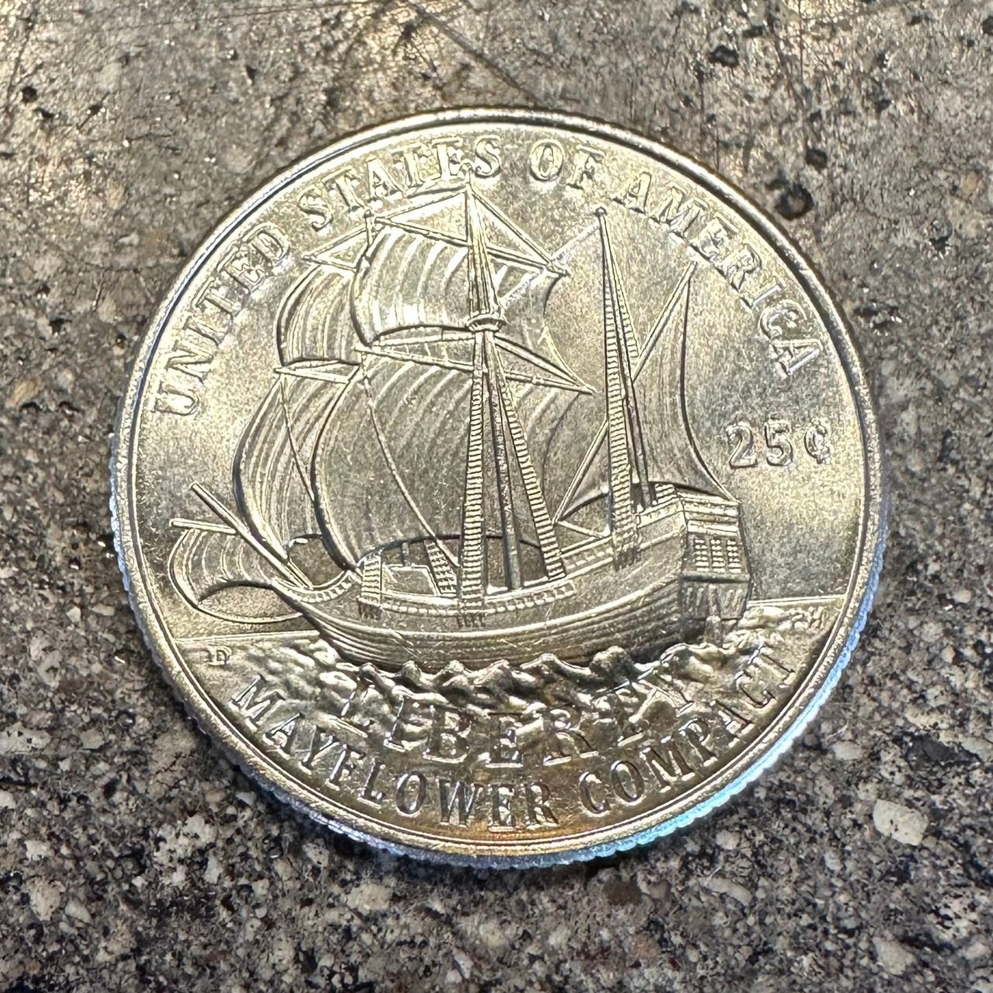 U.S. 2026 "Mayflower" Quarter Coin front on a concrete background. - Mountainstruck Coin Jewelry