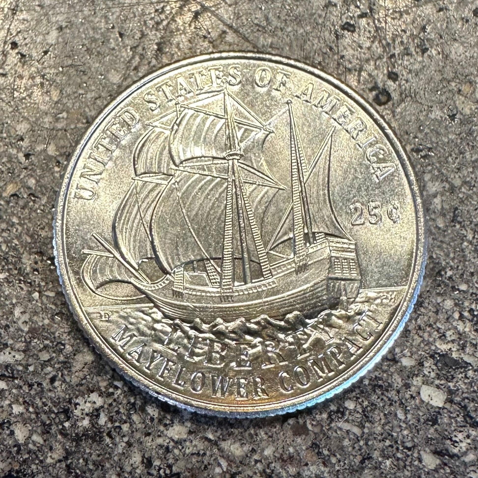 U.S. 2026 "Mayflower" Quarter Coin front on a concrete background. - Mountainstruck Coin Jewelry