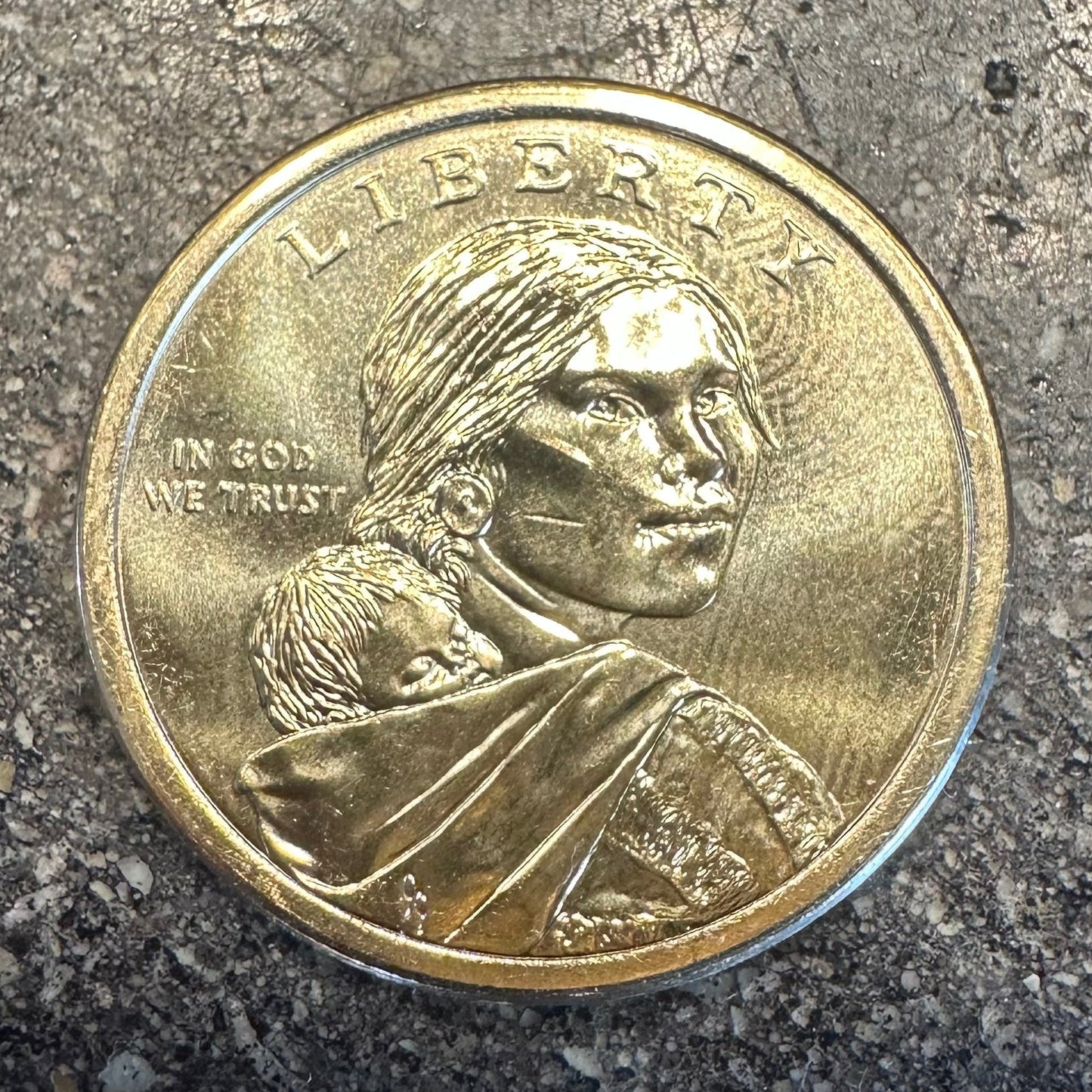 U.S. 2026 Oneida Allies 1 Dollar Coin front on a concrete background. - Mountainstruck Coin Jewelry