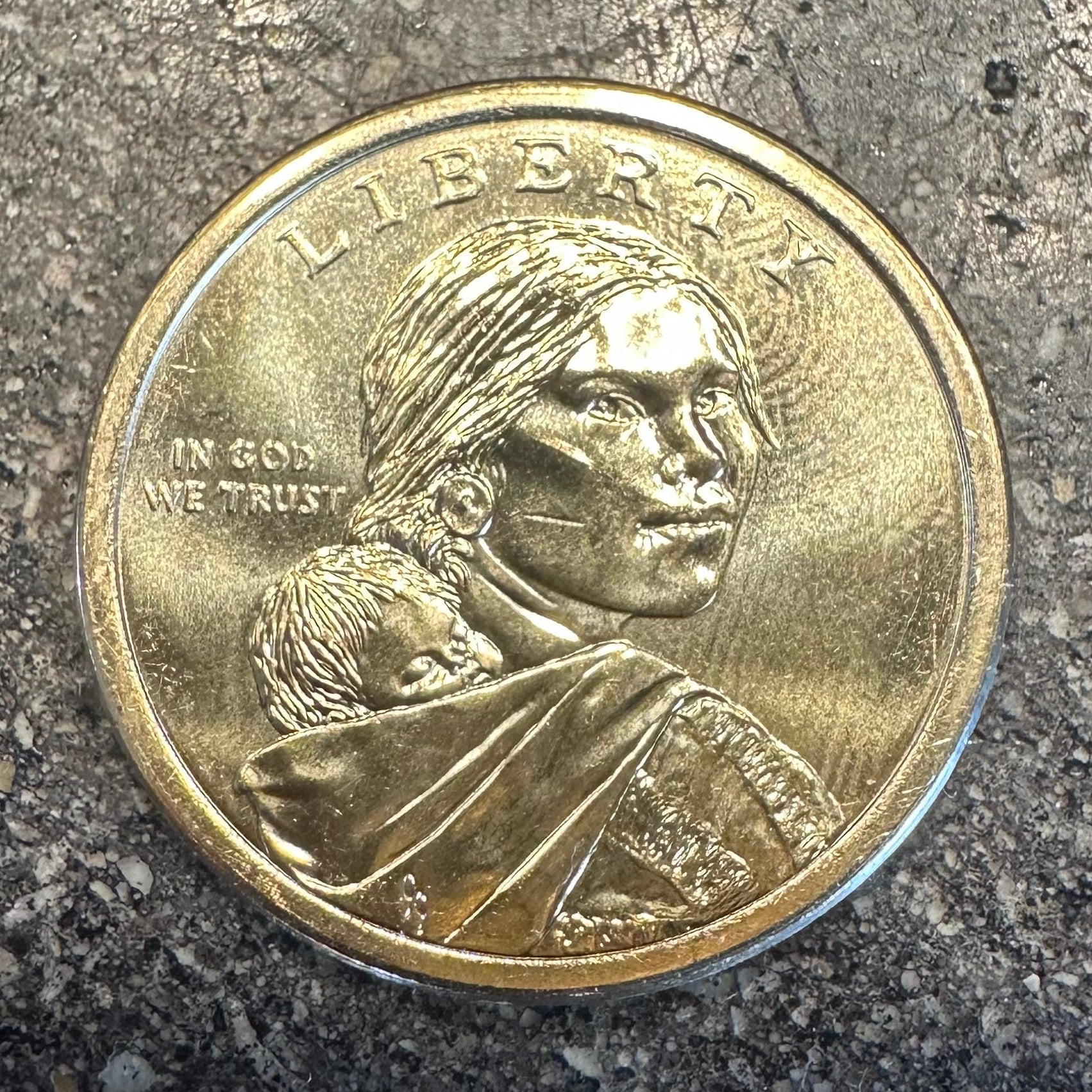 U.S. 2026 Oneida Allies 1 Dollar Coin front on a concrete background. - Mountainstruck Coin Jewelry