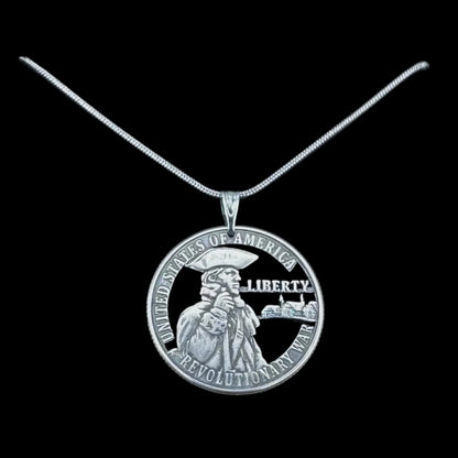 U.S. 2026 "Revolutionary War" Quarter Hand Cut Coin Necklace on a black background. - Mountainstruck Coin Jewelry