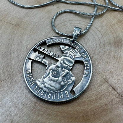 U.S. 2026 "Revolutionary War" Quarter Hand Cut Coin Necklace back with a snake chain on a wood background. - Mountainstruck Coin Jewelry