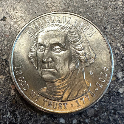 U.S. 2026 "Revolutionary War" Quarter Coin front on a concrete background. - Mountainstruck Coin Jewelry