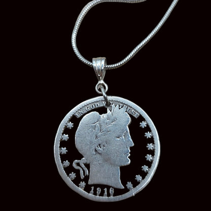 U.S. Barber Quarter Hand Cut Silver Coin Necklace with a snake chain on a black background. -Mountainstruck Coin Jewelry