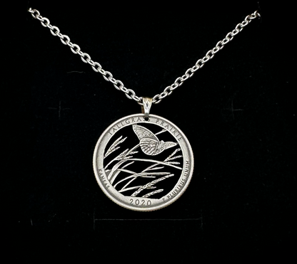 U.S. Butterfly Tallgrass Prairie Quarter Hand Cut Coin Necklace with  a stainless chain on a black velvet background - Mountainstruck Coin Jewelry