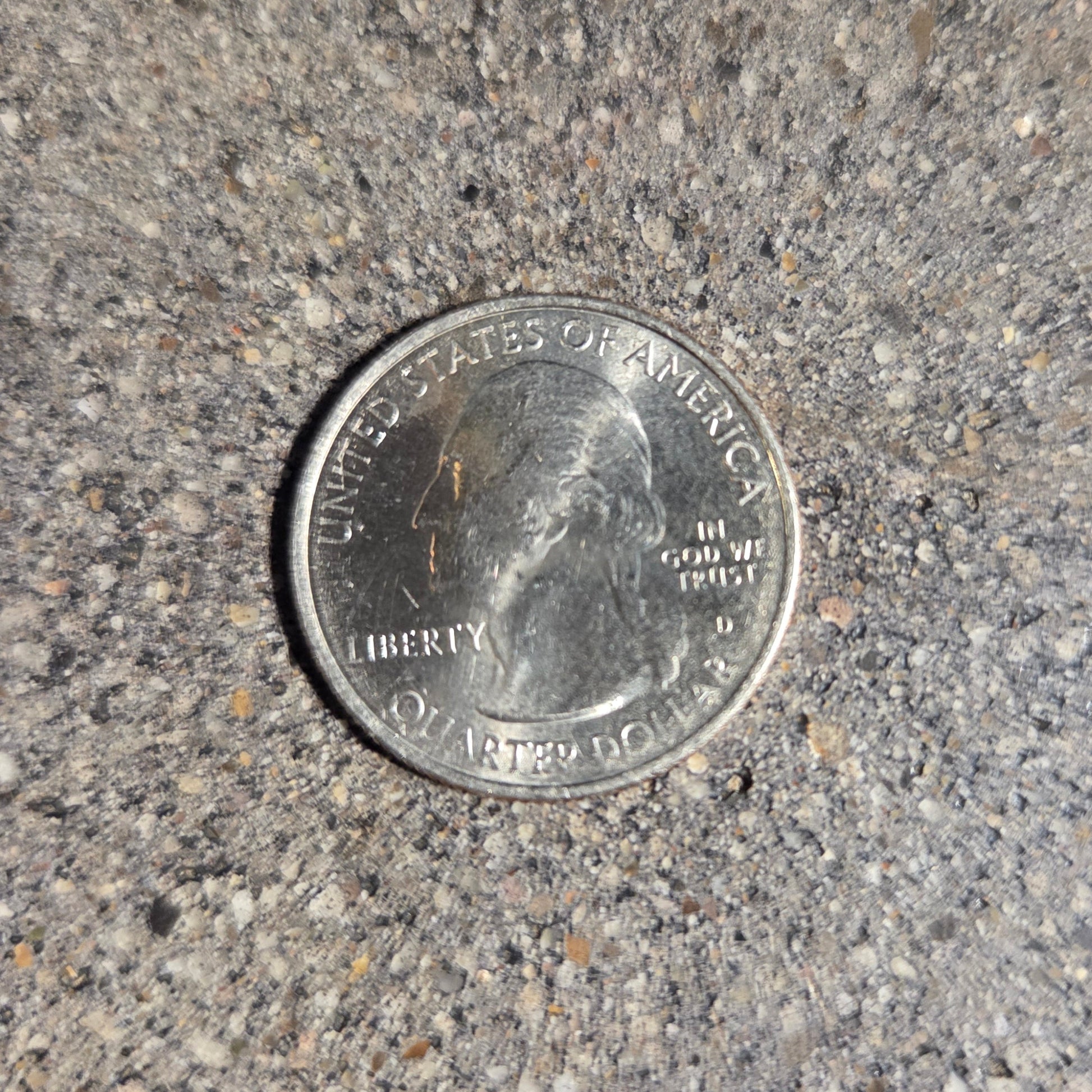 U.S. Butterfly Tallgrass Prairie Quarter Coin front on a concrete background - Mountainstruck Coin Jewelry