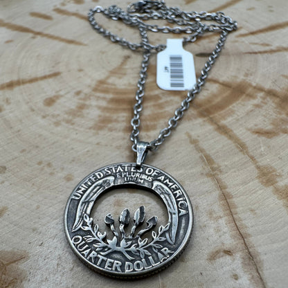U.S. Custom Mushroom Quarter Hand Cut Coin Necklace with stainless chain on a wood background.- Mountainstruck Coin Jewelry