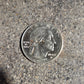 U.S. First American Woman in Space Coin front on a concrete background. - Mountainstruck Coin Jewelry