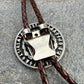 U.S. Morgan Hand Cut Silver Dollar Coin Bolo Tie (reverse) back on a grey rock surface. - Mountainstruck Coin Jewelry