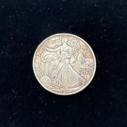 U.S. Silver Eagle coin front on a black velvet background. - Mountainstruck Coin Jewelry