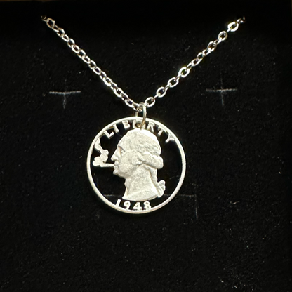 U.S. Smoking GW Silver Quarter Hand Cut Coin Necklace with a stainless chain on a black velvet background. - Mountainstruck Coin Jewelry