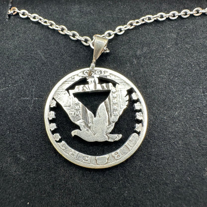 U.S. Soaring Eagle Quarter Hand Cut Silver Coin Necklace back on a black velvet background - Mountainstruck Coin Jewelry