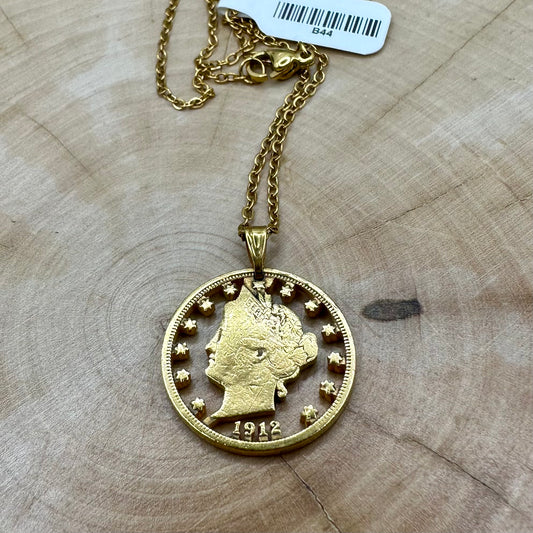 U.S. "V" Nickel Hand Cut Coin Necklace with a gold plated chain with a wood background. - Mountainstruck Coin Jewelry