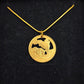 U.S. Yellowstone National Park Quarter Hand Cut Coin Necklace 24k gold plate on a black velvet background. - Mountainstruck Coin Jewelry