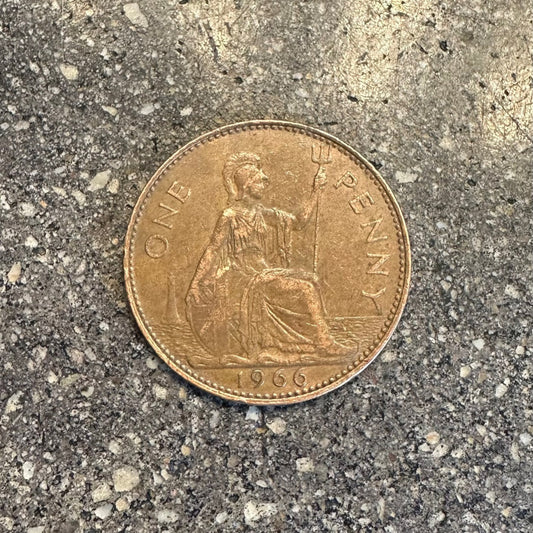 UK One Penny Coin back on a concrete background. - Mountainstruck Coin Jewelry