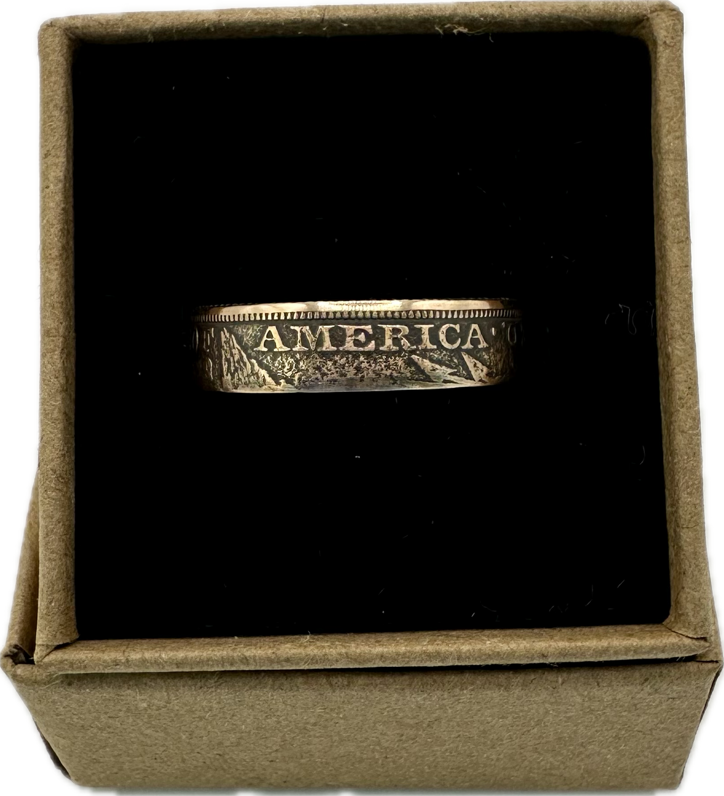 22k U.S. Gold Half Eagle $5 Coin Ring in a brown kraft box on a black velvet background. - Mountainstruck Coin Jewelry