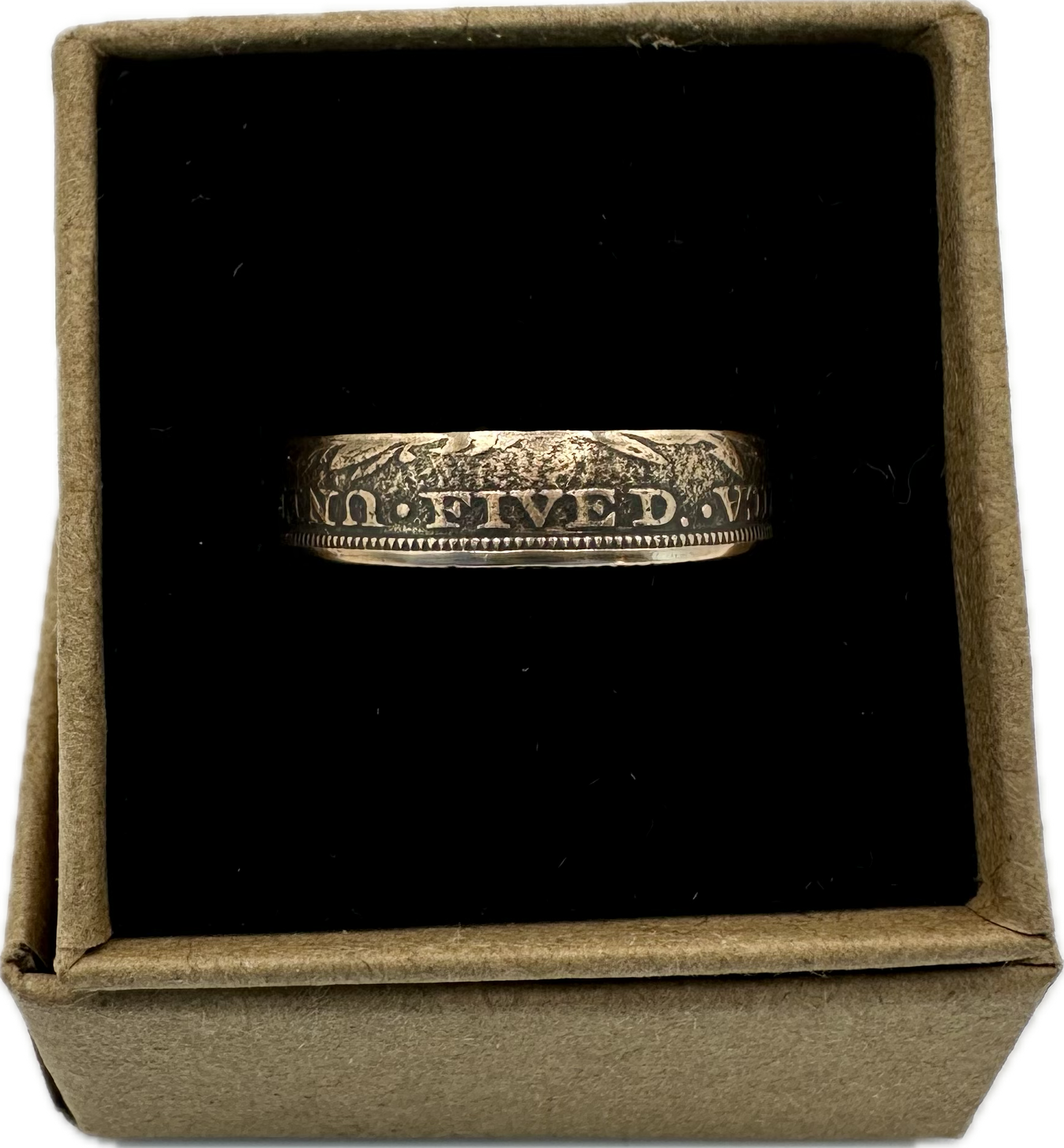 22k U.S. Gold Half Eagle $5 Coin Ring in a brown kraft box on a black velvet background. - Mountainstruck Coin Jewelry