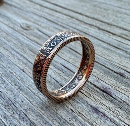 22k U.S. Gold Half Eagle $5 Coin Ring  on its side on a grey wood background. - Mountainstruck Coin Jewelry