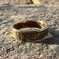 22k U.S. Gold Half Eagle $5 Coin Ring on a grey rock surface. - Mountainstruck Coin Jewelry