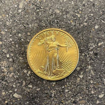 U.S. Gold Eagle 1/4 oz Fine Gold Coin back on a concrete background. - Mountainstruck Coin Jewelry