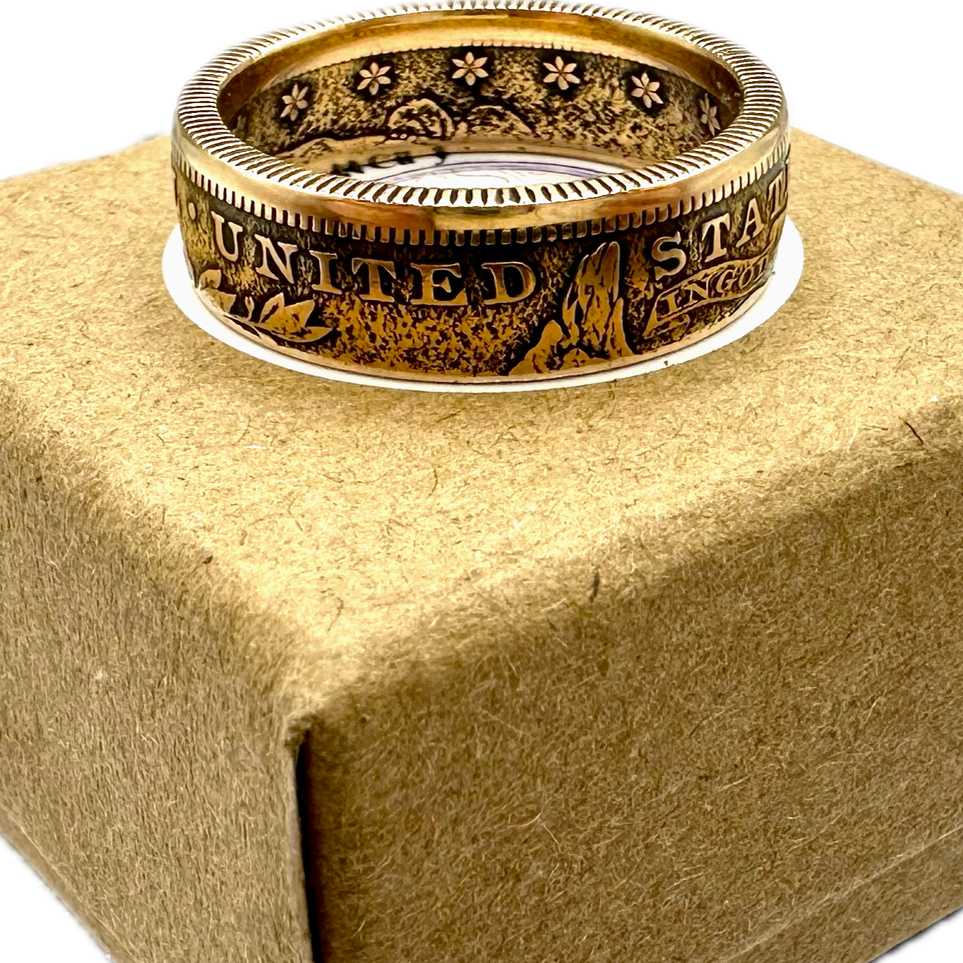 22k U.S. Gold Eagle $10 Coin Ring on a brown kraft box. - Mountainstruck Coin Jewelry