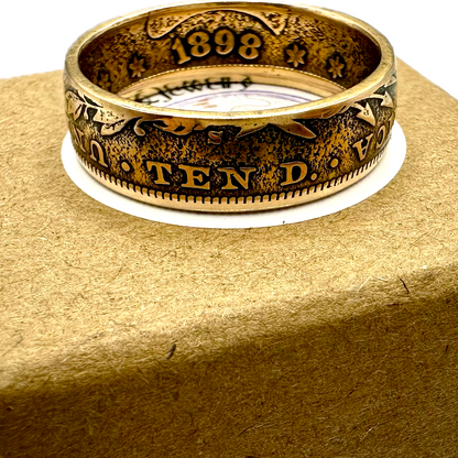 22k U.S. Gold Eagle $10 Coin Ring on a brown kraft box. - Mountainstruck Coin Jewelry