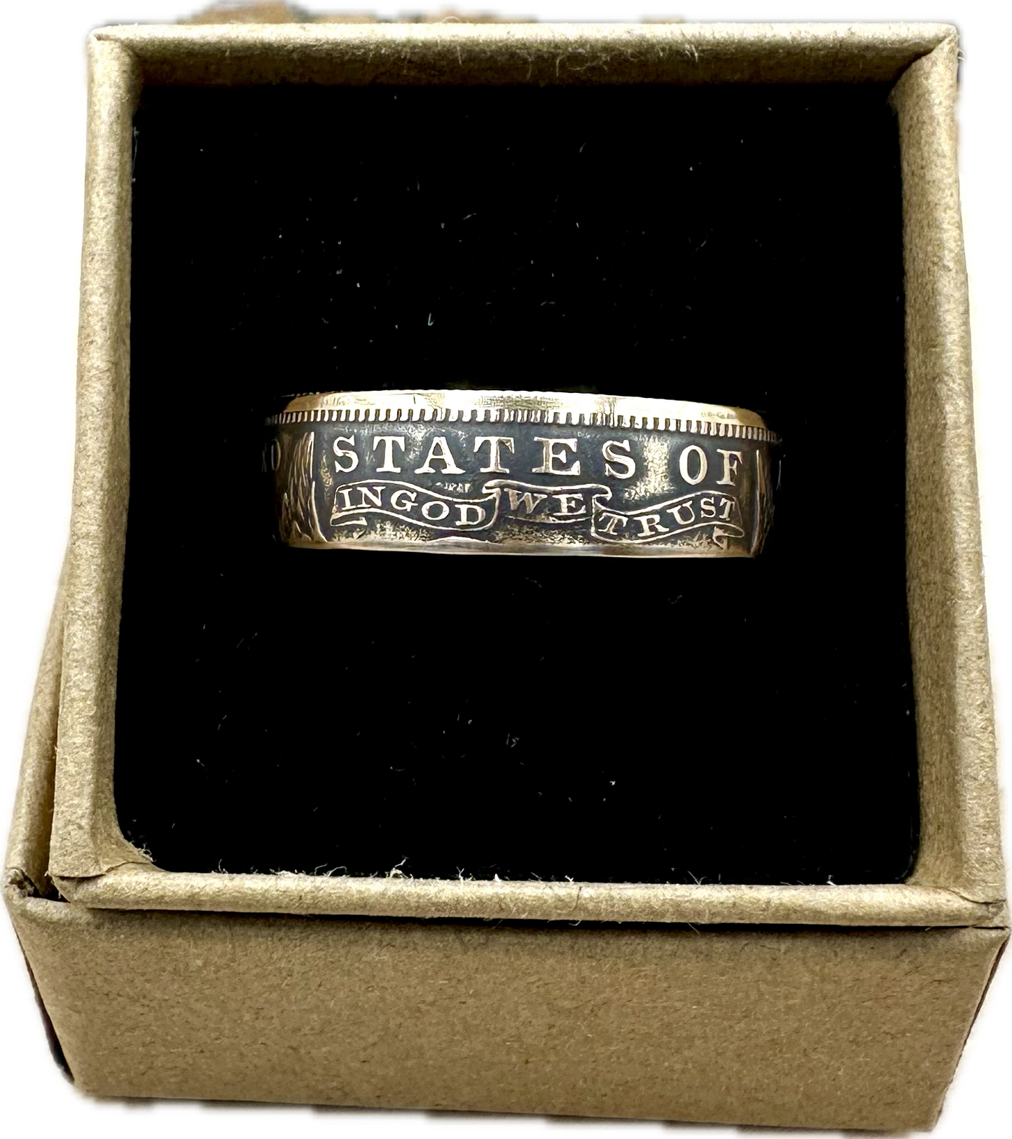 22k U.S. Gold Eagle $10 Coin Ring in a brown kraft box on a black velvet background. - Mountainstruck Coin Jewelry