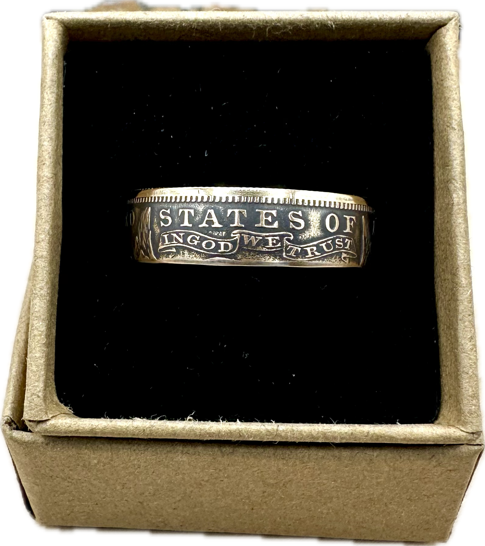22k U.S. Gold Eagle $10 Coin Ring in a brown kraft box on a black velvet background. - Mountainstruck Coin Jewelry