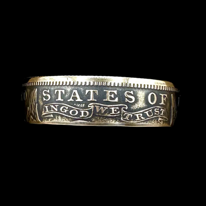 22k U.S. Gold Eagle $10 Coin Ring in a brown kraft box on a black velvet background. - Mountainstruck Coin Jewelry