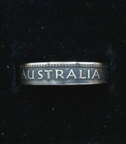 Australia Shilling Silver Coin Ring in a brown kraft box on a black velvet background. - Mountainstruck Coin Jewelry