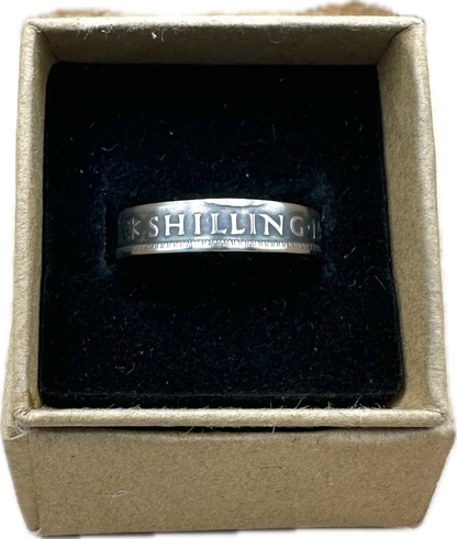 Australia Shilling Silver Coin Ring in a brown kraft box on a black velvet background. - Mountainstruck Coin Jewelry