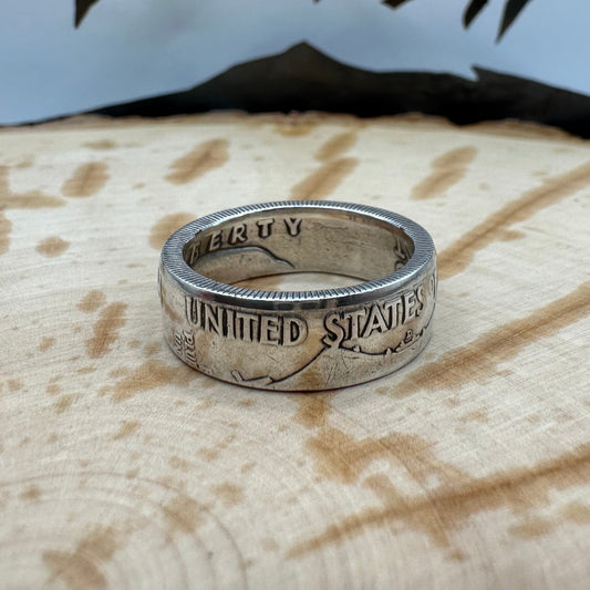 Ben Franklin Half Dollar Silver Coin Ring on a wood background. - Mountainstruck Coin Jewelry