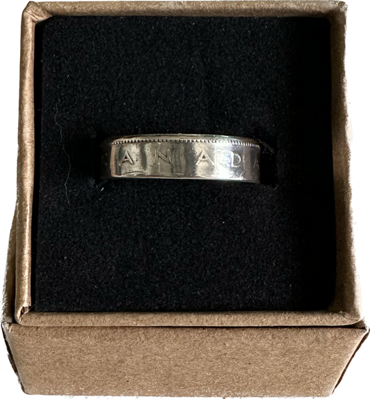Canada 25 Cents Silver Coin Ring in a brown kraft box on a black velvet background. - Mountainstruck Coin Jewelry