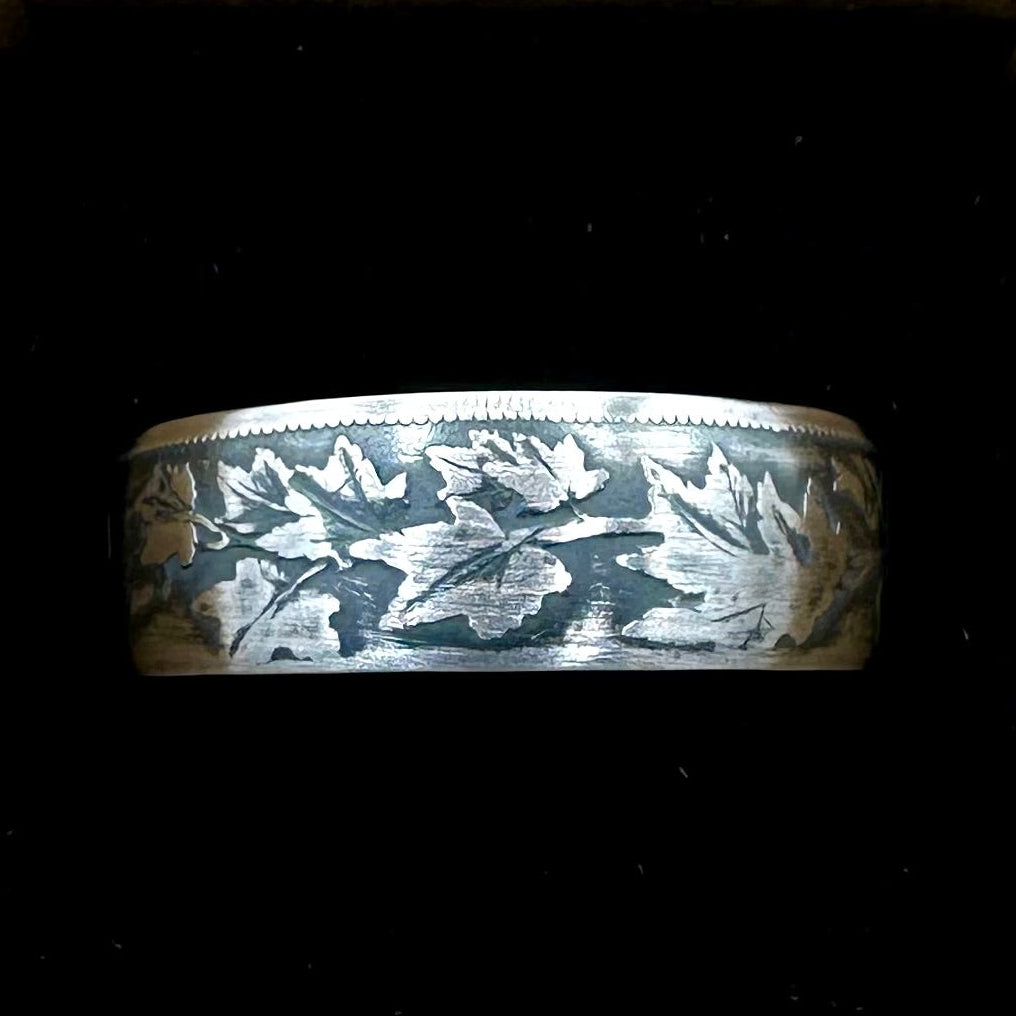 Canada 50 Cents Maple Leaf Silver Coin Ring in a brown kraft box on a black velvet background. - Mountainstruck Coin Jewelry